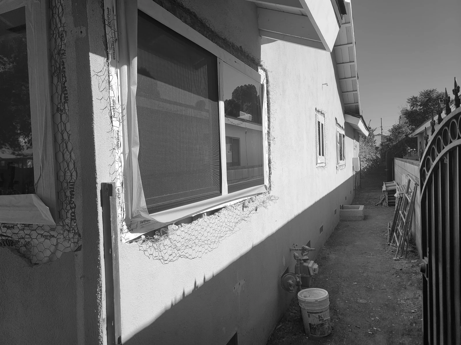 Window and exterior wall being restored